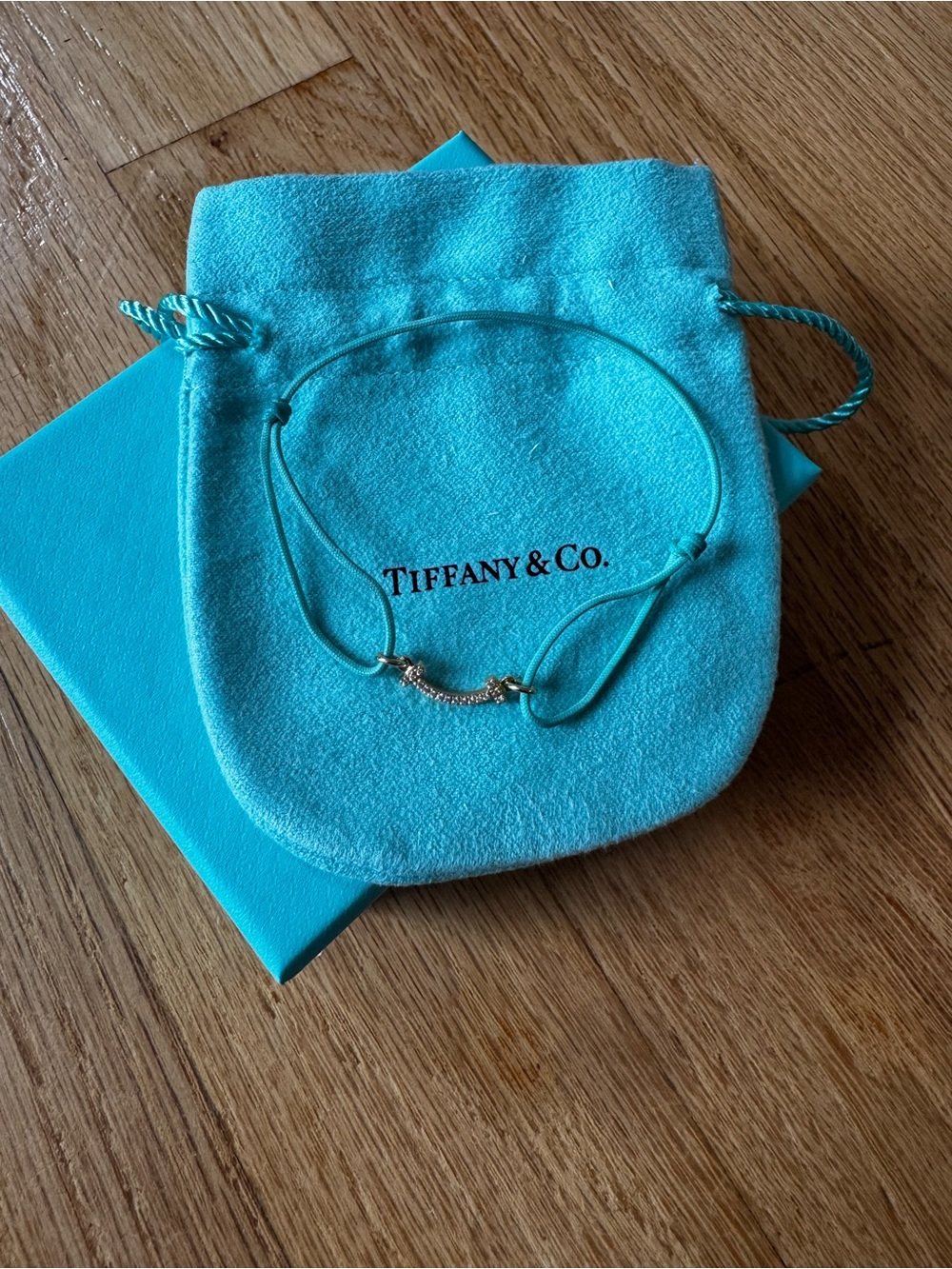 Tiffany & Co. Tiffany Blue Cord Bracelet with 18k RG Tsmile and Diamond Accent